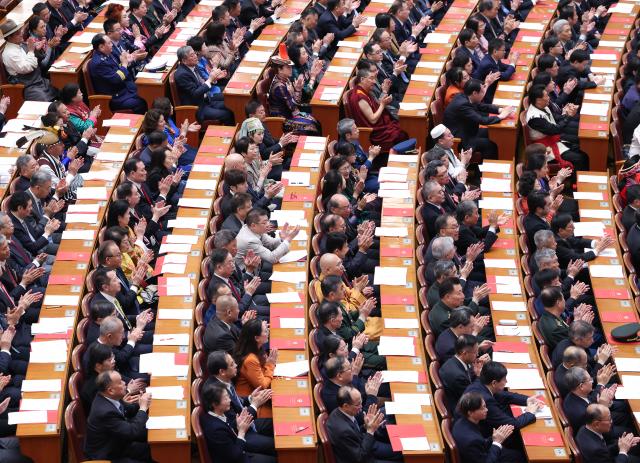 (260311) -- BEIJING, March 11, 2026 (Xinhua) -- The closing meeting of the fourth session of the 14th National Committee of the Chinese People's Political Consultative Conference (CPPCC) is held at the Great Hall of the People in Beijing, capital of China, March 11, 2026. (Xinhua/Liu Bin)
