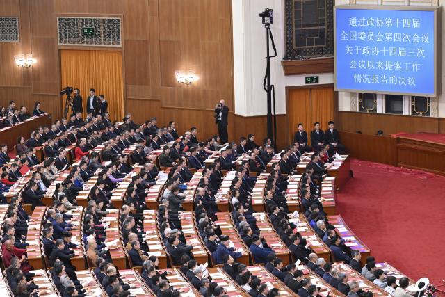 (260311) -- BEIJING, March 11, 2026 (Xinhua) -- The closing meeting of the fourth session of the 14th National Committee of the Chinese People's Political Consultative Conference (CPPCC) is held at the Great Hall of the People in Beijing, capital of China, March 11, 2026. (Xinhua/Li He)