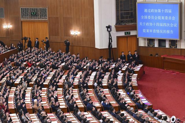 (260311) -- BEIJING, March 11, 2026 (Xinhua) -- The closing meeting of the fourth session of the 14th National Committee of the Chinese People's Political Consultative Conference (CPPCC) is held at the Great Hall of the People in Beijing, capital of China, March 11, 2026. (Xinhua/Li He)