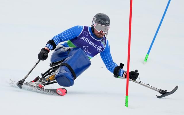 (260311) -- CORTINA D'AMPEZZO, March 11, 2026 (Xinhua) -- Rene de Silvestro of Italy competes during the Para Alpine Skiing Men's Alpine Combined Sitting event at the Milan-Cortina 2026 Paralympic Winter Games in Cortina D'ampezzo, Italy, March 10, 2026. (Xinhua/Wang Kaiyan)