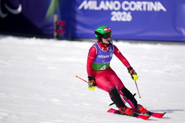 (260311) -- CORTINA D'AMPEZZO, March 11, 2026 (Xinhua) -- Elina Stary of Austria competes during the para alpine skiing women's combined vision impaired event at the Milan-Cortina 2026 Paralympic Winter Games in Cortina D'ampezzo, Italy, March 10, 2026. (Xinhua/Lian Yi)