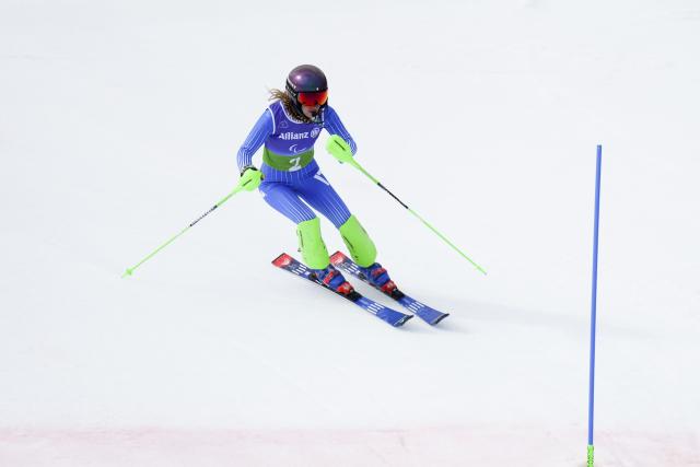 (260311) -- CORTINA D'AMPEZZO, March 11, 2026 (Xinhua) -- Chiara Mazzel of Italy competes during the para alpine skiing women's combined vision impaired event at the Milan-Cortina 2026 Paralympic Winter Games in Cortina D'ampezzo, Italy, March 10, 2026. (Xinhua/Lian Yi)