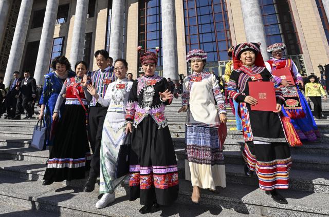 (260311) -- BEIJING, March 11, 2026 (Xinhua) -- Members of the 14th National Committee of the Chinese People's Political Consultative Conference (CPPCC) leave the Great Hall of the People after the closing meeting of the fourth session of the 14th CPPCC National Committee in Beijing, capital of China, March 11, 2026. (Xinhua/Chen Yichen)