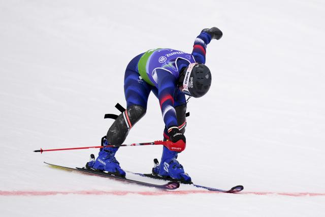 (260311) -- CORTINA D'AMPEZZO, March 11, 2026 (Xinhua) -- Aurelie Richard of France crosses the finish line during the para alpine skiing women's combined standing event at the Milan-Cortina 2026 Paralympic Winter Games in Cortina D'ampezzo, Italy, March 10, 2026. (Xinhua/Lian Yi)