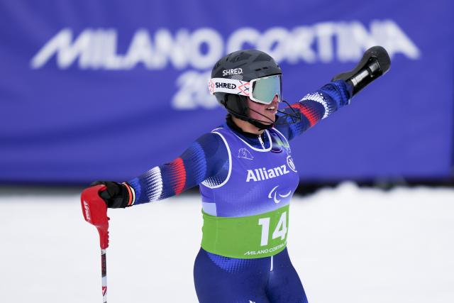 (260311) -- CORTINA D'AMPEZZO, March 11, 2026 (Xinhua) -- Aurelie Richard of France celebrates after the para alpine skiing women's combined standing event at the Milan-Cortina 2026 Paralympic Winter Games in Cortina D'ampezzo, Italy, March 10, 2026. (Xinhua/Lian Yi)