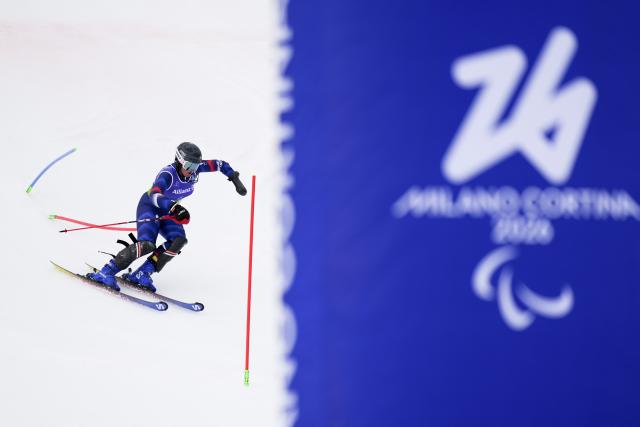 (260311) -- CORTINA D'AMPEZZO, March 11, 2026 (Xinhua) -- Aurelie Richard of France competes during the para alpine skiing women's combined standing event at the Milan-Cortina 2026 Paralympic Winter Games in Cortina D'ampezzo, Italy, March 10, 2026. (Xinhua/Lian Yi)