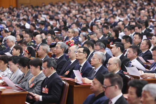 (260311) -- BEIJING, March 11, 2026 (Xinhua) -- The closing meeting of the fourth session of the 14th National Committee of the Chinese People's Political Consultative Conference (CPPCC) is held at the Great Hall of the People in Beijing, capital of China, March 11, 2026. (Xinhua/Liu Weibing)