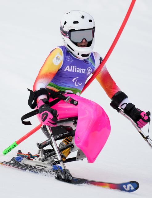 (260311) -- CORTINA D'AMPEZZO, March 11, 2026 (Xinhua) -- Audrey Pascual Seco of Spain competes during the para alpine skiing women's combined sitting event at the Milan-Cortina 2026 Paralympic Winter Games in Cortina D'ampezzo, Italy, March 10, 2026. (Xinhua/Wang Kaiyan)