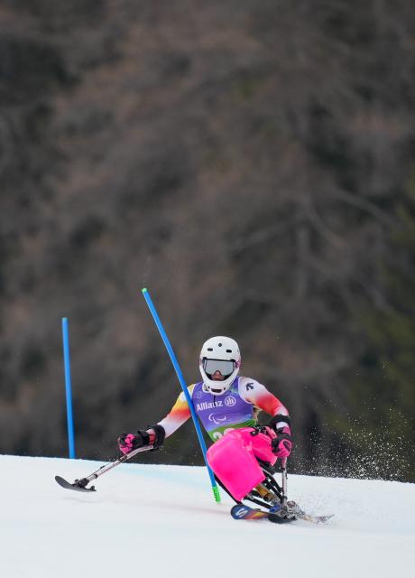 (260311) -- CORTINA D'AMPEZZO, March 11, 2026 (Xinhua) -- Audrey Pascual Seco of Spain competes during the para alpine skiing women's combined sitting event at the Milan-Cortina 2026 Paralympic Winter Games in Cortina D'ampezzo, Italy, March 10, 2026. (Xinhua/Wang Kaiyan)