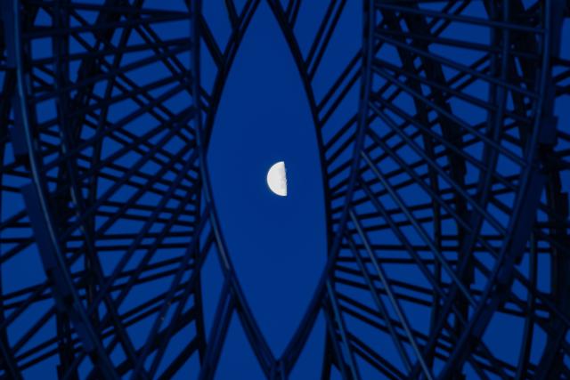 (260311) -- HARBIN, March 11, 2026 (Xinhua) -- This photo taken on March 11, 2026 shows a last quarter moon observed in Bei'an, northeast China's Heilongjiang Province.
  The smallest last quarter moon of 2026 appeared on Wednesday. A last quarter moon rises around midnight and sets around noon. (Photo by Qian Boyu/Xinhua)