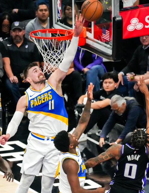 (260311) -- SACRAMENTO, March 11, 2026 (Xinhua) -- Micah Potter (L) of Sacramento Kings blocks during the 2025-2026 NBA regular season game between Sacramento Kings and Indiana Pacers in Sacramento, the United States, March 10, 2026. (Photo by Sun Yuxuan/Xinhua)