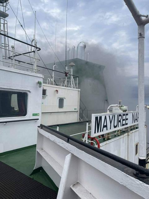 (260311) -- BANGKOK, March 11, 2026 (Xinhua) -- A fire breaks out on a Thai cargo ship after it was struck in the Strait of Hormuz on March 11, 2026. A Thai cargo ship came under attack on Wednesday while sailing in the Strait of Hormuz, said the Royal Thai Navy. So far, 20 crew members have been rescued and taken to Oman for settlement. (Royal Thai Navy/Handout via Xinhua)