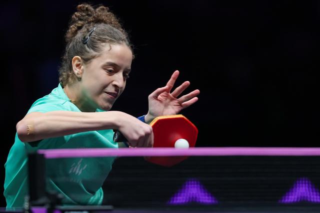 (260311) -- CHONGQING, March 11, 2026 (Xinhua) -- Hana Goda of Egypt hits a return during the women's singles round of 32 match against Wang Yidi of China at the WTT Champions Chongqing 2026 in southwest China's Chongqing, March 11, 2026. (Xinhua/Huang Wei)