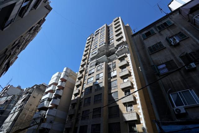 (260311) -- BEIRUT, March 11, 2026 (Xinhua) -- This photo taken on March, 11, 2026 shows an apartment building damaged during an Israel airstrike in the Aisha Bakkar area of central Beirut, Lebanon.
  At least 15 people were killed and 24 others injured in a series of Israeli airstrikes against Lebanon from Tuesday night to Wednesday morning, Lebanon's Public Health Ministry said.
   The airstrikes targeted several areas in southern Lebanon, the Bekaa Valley in eastern Lebanon, and the capital of Beirut, according to statements issued by the ministry's Emergency Operations Center. (Photo by Bilal Jawich/Xinhua)