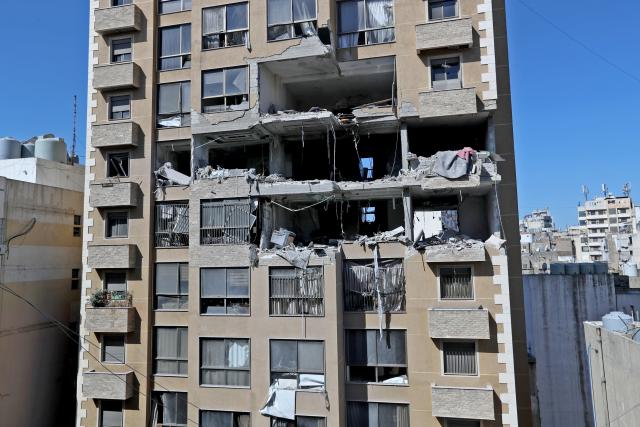 (260311) -- BEIRUT, March 11, 2026 (Xinhua) -- This photo taken on March, 11, 2026 shows an apartment building damaged during an Israel airstrike in the Aisha Bakkar area of central Beirut, Lebanon.
  At least 15 people were killed and 24 others injured in a series of Israeli airstrikes against Lebanon from Tuesday night to Wednesday morning, Lebanon's Public Health Ministry said.
   The airstrikes targeted several areas in southern Lebanon, the Bekaa Valley in eastern Lebanon, and the capital of Beirut, according to statements issued by the ministry's Emergency Operations Center. (Photo by Bilal Jawich/Xinhua)