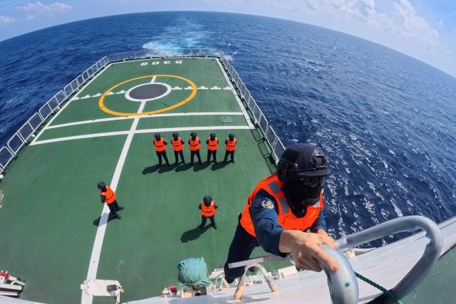 (260311) -- SOUTH CHINA SEA, March 11, 2026 (Xinhua) -- Law enforcers conduct access and control training aboard the China Coast Guard (CCG) vessel Sandu in the South China Sea, March 8, 2026. The CCG vessel Sandu conducted patrols in the South China Sea to safeguard China's territorial sovereignty and maritime rights and interests. (Xinhua/Mao Jun)
