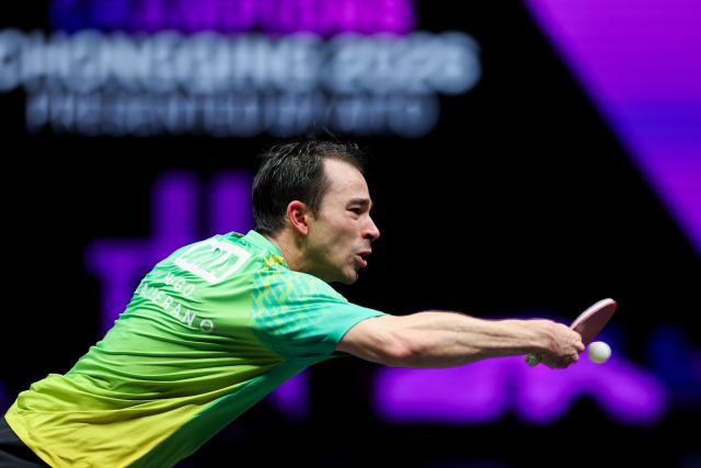 (260311) -- CHONGQING, March 11, 2026 (Xinhua) -- Hugo Calderano of Brazil hits a return during the men's singles round of 32 match against Chen Yuanyu of China at the WTT Champions Chongqing 2026 in southwest China's Chongqing, March 11, 2026. (Xinhua/Huang Wei)