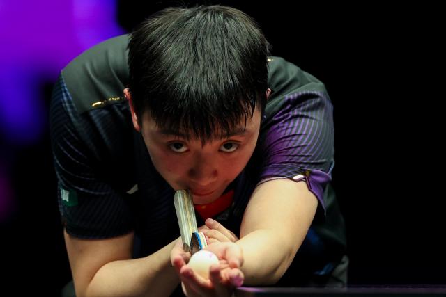 (260311) -- CHONGQING, March 11, 2026 (Xinhua) -- Chen Yuanyu of China serves during the men's singles round of 32 match against Hugo Calderano of Brazil at the WTT Champions Chongqing 2026 in southwest China's Chongqing, March 11, 2026. (Xinhua/Huang Wei)