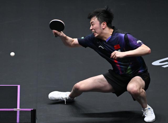 (260311) -- CHONGQING, March 11, 2026 (Xinhua) -- Chen Yuanyu of China hits a return during the men's singles round of 32 match against Hugo Calderano of Brazil at the WTT Champions Chongqing 2026 in southwest China's Chongqing, March 11, 2026. (Xinhua/Chen Cheng)