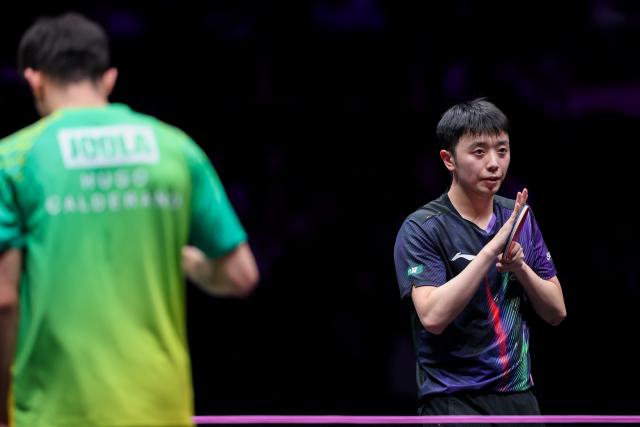 (260311) -- CHONGQING, March 11, 2026 (Xinhua) -- Chen Yuanyu of China reacts during the men's singles round of 32 match against Hugo Calderano of Brazil at the WTT Champions Chongqing 2026 in southwest China's Chongqing, March 11, 2026. (Xinhua/Huang Wei)