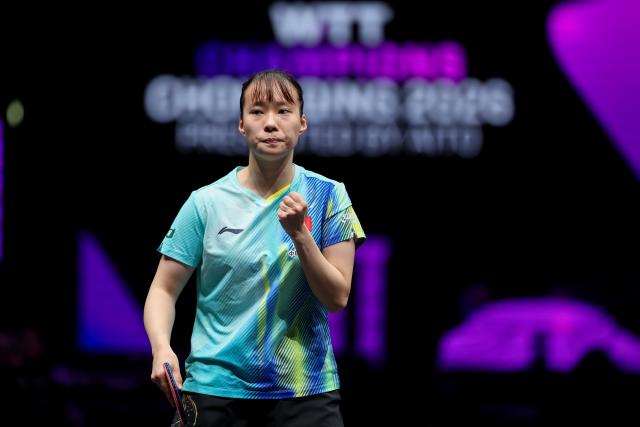 (260311) -- CHONGQING, March 11, 2026 (Xinhua) -- Shi Xunyao of China celebrates a score during the women's singles round of 32 match against Yuan Jianan of France at the WTT Champions Chongqing 2026 in southwest China's Chongqing, March 11, 2026. (Xinhua/Huang Wei)