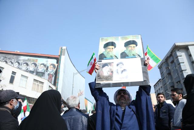 (260311) -- TEHRAN, March 11, 2026 (Xinhua) -- People attend a funeral held for Iranian high-ranking military commanders killed during strikes launched by the United States and Israel against Iran in Tehran, Iran, March 11, 2026. (Xinhua/Shadati)