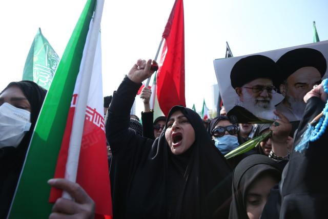(260311) -- TEHRAN, March 11, 2026 (Xinhua) -- People attend a funeral held for Iranian high-ranking military commanders killed during strikes launched by the United States and Israel against Iran in Tehran, Iran, March 11, 2026. (Xinhua/Shadati)