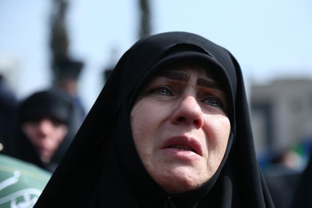 (260311) -- TEHRAN, March 11, 2026 (Xinhua) -- A woman attends a funeral held for Iranian high-ranking military commanders killed during strikes launched by the United States and Israel against Iran in Tehran, Iran, March 11, 2026. (Xinhua/Shadati)