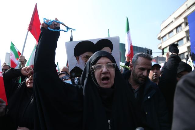 (260311) -- TEHRAN, March 11, 2026 (Xinhua) -- People attend a funeral held for Iranian high-ranking military commanders killed during strikes launched by the United States and Israel against Iran in Tehran, Iran, March 11, 2026. (Xinhua/Shadati)