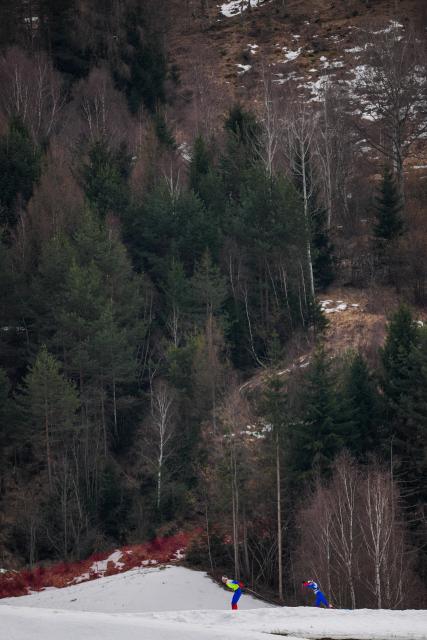 (260311) -- TESERO, March 11, 2026 (Xinhua) -- Anastasiia Bagiian (R) of Russia and her guider Sergei Siniakin compete during the women's 10km interval start classic Vision Impaired of Para Cross-Country Skiing at the Milan-Cortina 2026 Paralympic Winter Games in Tesero, Italy, March 11, 2026. (Xinhua/Lian Zhen)