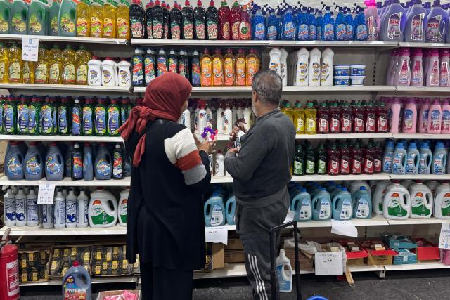 (260311) -- CAIRO, March 11, 2026 (Xinhua) -- People shop at a market in Cairo, Egypt, on March 11, 2026. TO GO WITH "Feature: Living the unseen war -- Egyptians feel ripple effects of Iran conflict" (Xinhua/Ahmed Gomaa)