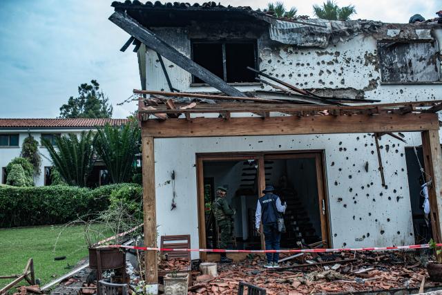 (260311) -- GOMA, March 11, 2026 (Xinhua) -- Rescue workers check damages after a drone attack in Goma, eastern Democratic Republic of the Congo (DRC), on March 11, 2026. Explosions were heard on Wednesday morning. The March 23 Movement (M23) rebel group attributed a drone strike to the Congolese government's military forces. According to a provisional toll released by M23, three people were killed, including a French national working for the United Nations Children's Fund. (Str/Xinhua)