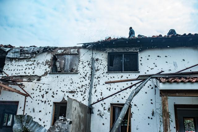 (260311) -- GOMA, March 11, 2026 (Xinhua) -- This photo taken on March 11, 2026, shows damages outside a building after a drone attack in Goma, eastern Democratic Republic of the Congo (DRC). Explosions were heard on Wednesday morning. The March 23 Movement (M23) rebel group attributed a drone strike to the Congolese government's military forces. According to a provisional toll released by M23, three people were killed, including a French national working for the United Nations Children's Fund. (Str/Xinhua)