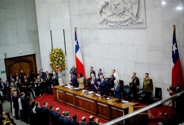 (260311) -- SANTIAGO, March 11, 2026 (Xinhua) -- Chile's new president Jose Antonio Kast (C, with sash) attends the inauguration ceremony at the National Congress in Valparaiso, Chile, March 11, 2026. Kast took office on Wednesday as Chile's new president for the 2026-2030 term, succeeding Gabriel Boric. (Agencia UNO/Handout via Xinhua)