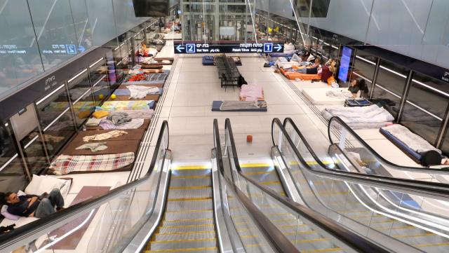 (260312) -- RAMAT GAN, March 12, 2026 (Xinhua) -- People spend the night on a platform of a subway station in Ramat Gan, Israel, on March 11, 2026. Alarms were activated across Israel on Wednesday night as air defenses detected missiles and rockets launched from Iran and Lebanon. (Photo by Gil Cohen Magen/Xinhua)
