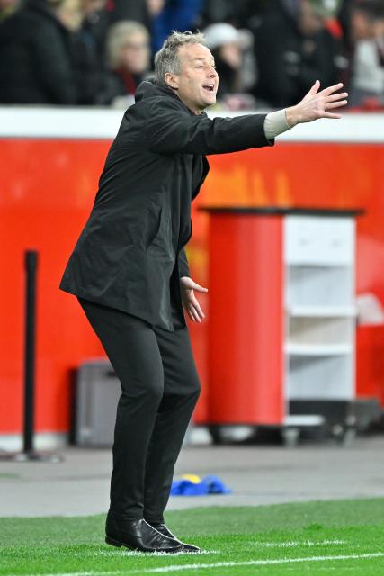 (260312) -- LEVERKUSEN, March 12, 2026 (Xinhua) -- Bayer 04 Leverkusen's head coach Kasper Hjulmand gestures during the UEFA Champions League round of 16 first leg match between Bayer 04 Leverkusen and Arsenal in Leverkusen, Germany, March 11, 2026. (Photo by Ulrich Hufnagel/Xinhua)
