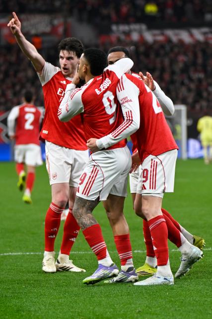 (260312) -- LEVERKUSEN, March 12, 2026 (Xinhua) -- Players of Arsenal celebrate scoring during the UEFA Champions League round of 16 first leg match between Bayer 04 Leverkusen and Arsenal in Leverkusen, Germany, March 11, 2026. (Photo by Ulrich Hufnagel/Xinhua)