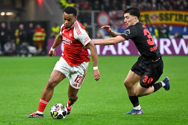 (260312) -- LEVERKUSEN, March 12, 2026 (Xinhua) -- Ibrahim Maza (R) of Bayer 04 Leverkusen vies with Jurrien Timber of Arsenal during the UEFA Champions League round of 16 first leg match between Bayer 04 Leverkusen and Arsenal in Leverkusen, Germany, March 11, 2026. (Photo by Ulrich Hufnagel/Xinhua)
