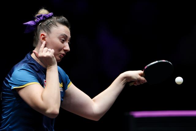 (260312) -- CHONGQING, March 12, 2026 (Xinhua) -- Sofia Polcanova hits a return during the women's singles round of 32 match between Chen Xingtong of China and Sofia Polcanova of Austria at the WTT Champions Chongqing 2026 in southwest China's Chongqing, March 12, 2026. (Xinhua/Huang Wei)