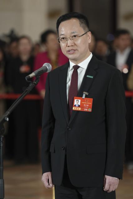 (260312) -- BEIJING, March 12, 2026 (Xinhua) -- Jia Shaoqian, a deputy to the 14th National People's Congress (NPC), attends a group interview ahead of the closing meeting of the fourth session of the 14th NPC at the Great Hall of the People in Beijing, capital of China, March 12, 2026. (Xinhua/Li Minggang)