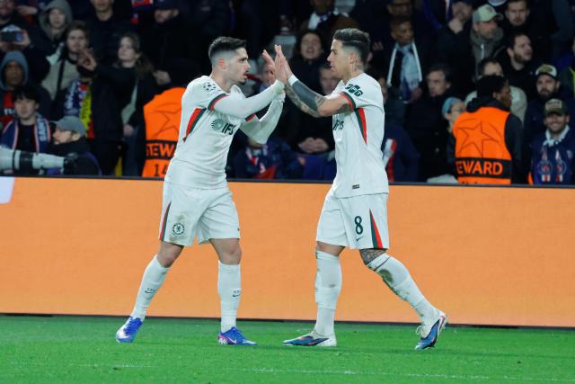 (260312) -- PARIS, March 12, 2026 (Xinhua) -- Enzo Fernandez (R) of Chelsea celebrates scoring during the UEFA Champions League round of 16 first leg match between Paris Saint-Germain (PSG) and Chelsea in Paris, France, March 11, 2026. (Photo by Henri Szwarc/Xinhua)