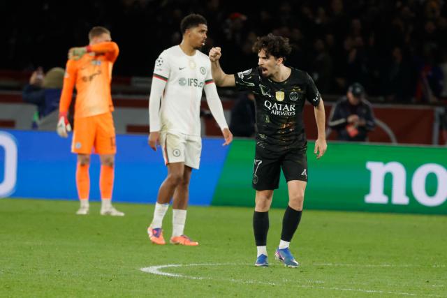 (260312) -- PARIS, March 12, 2026 (Xinhua) -- Vitinha (R) of Paris Saint-Germain celebrates scoring during the UEFA Champions League round of 16 first leg match between Paris Saint-Germain (PSG) and Chelsea in Paris, France, March 11, 2026. (Photo by Henri Szwarc/Xinhua)
