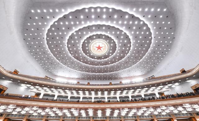 (260312) -- BEIJING, March 12, 2026 (Xinhua) -- This photo taken on March 12, 2026 shows an interior view of the Great Hall of the People, the venue for the closing meeting of the fourth session of the 14th National People's Congress (NPC), in Beijing, capital of China. (Xinhua/Li Xin)