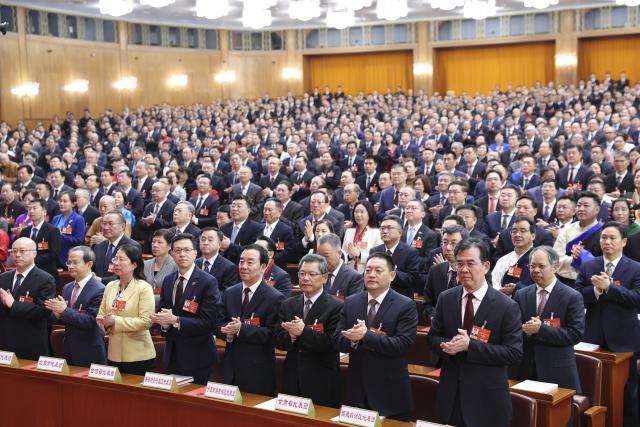 (260312) -- BEIJING, March 12, 2026 (Xinhua) -- The closing meeting of the fourth session of the 14th National People's Congress (NPC) is held at the Great Hall of the People in Beijing, capital of China, March 12, 2026. (Xinhua/Huang Jingwen)