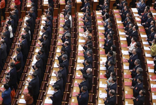 (260312) -- BEIJING, March 12, 2026 (Xinhua) -- The closing meeting of the fourth session of the 14th National People's Congress (NPC) is held at the Great Hall of the People in Beijing, capital of China, March 12, 2026. (Xinhua/Ding Lin)