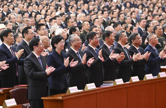 (260312) -- BEIJING, March 12, 2026 (Xinhua) -- The closing meeting of the fourth session of the 14th National People's Congress (NPC) is held at the Great Hall of the People in Beijing, capital of China, March 12, 2026. (Xinhua/Gao Jie)