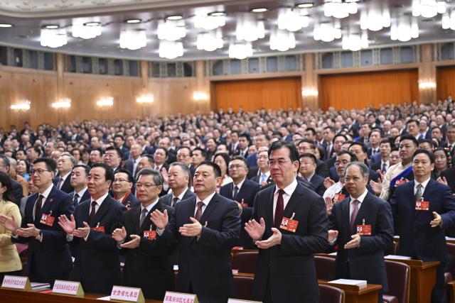 (260312) -- BEIJING, March 12, 2026 (Xinhua) -- The closing meeting of the fourth session of the 14th National People's Congress (NPC) is held at the Great Hall of the People in Beijing, capital of China, March 12, 2026. (Xinhua/Li Xiang)