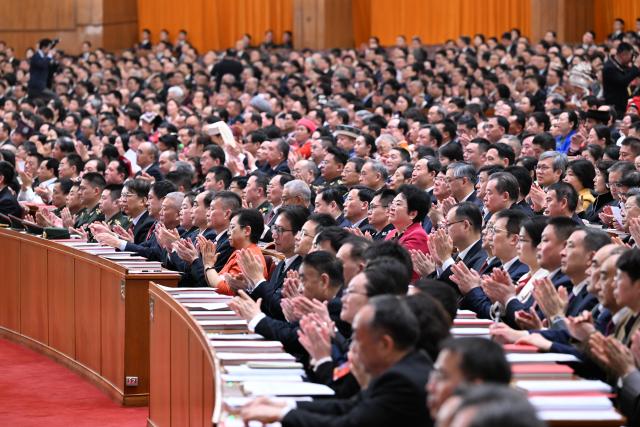 (260312) -- BEIJING, March 12, 2026 (Xinhua) -- The closing meeting of the fourth session of the 14th National People's Congress (NPC) is held at the Great Hall of the People in Beijing, capital of China, March 12, 2026. (Xinhua/Rao Aimin)