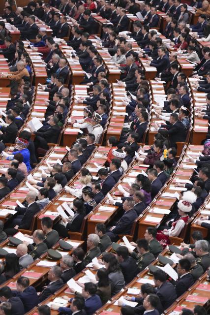 (260312) -- BEIJING, March 12, 2026 (Xinhua) -- The closing meeting of the fourth session of the 14th National People's Congress (NPC) is held at the Great Hall of the People in Beijing, capital of China, March 12, 2026. (Xinhua/Wang Xi)