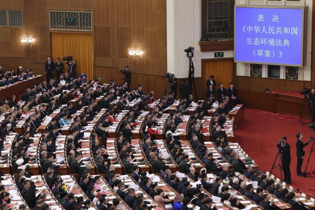 (260312) -- BEIJING, March 12, 2026 (Xinhua) -- The closing meeting of the fourth session of the 14th National People's Congress (NPC) is held at the Great Hall of the People in Beijing, capital of China, March 12, 2026. (Xinhua/Jin Liwang)